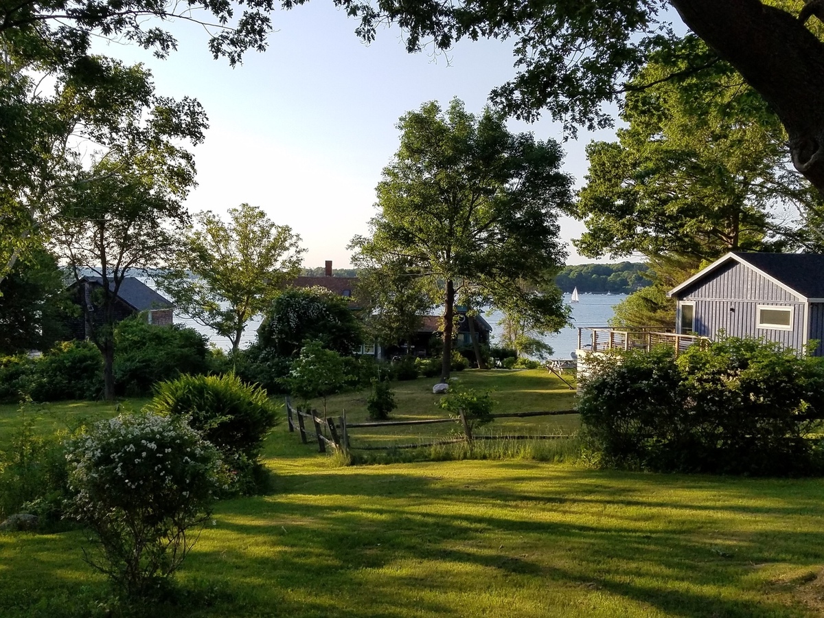 [House showing wrap-around porch]